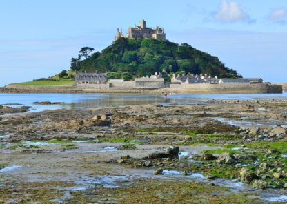 St Michael's Mount in Penzance with the tide out and blue sky