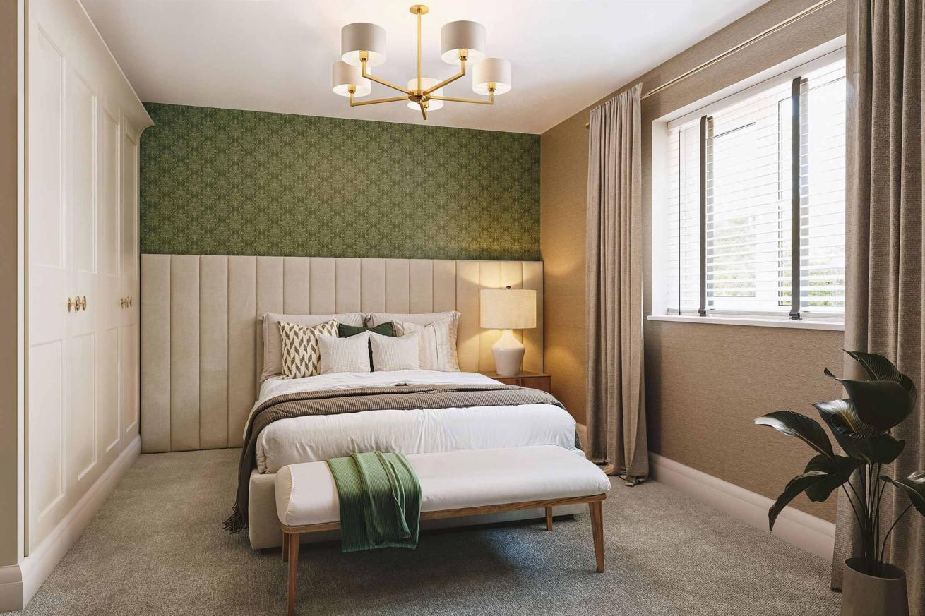 Elegant bedroom featuring a green accent wall, upholstered headboard, and a bench at the foot of the bed.