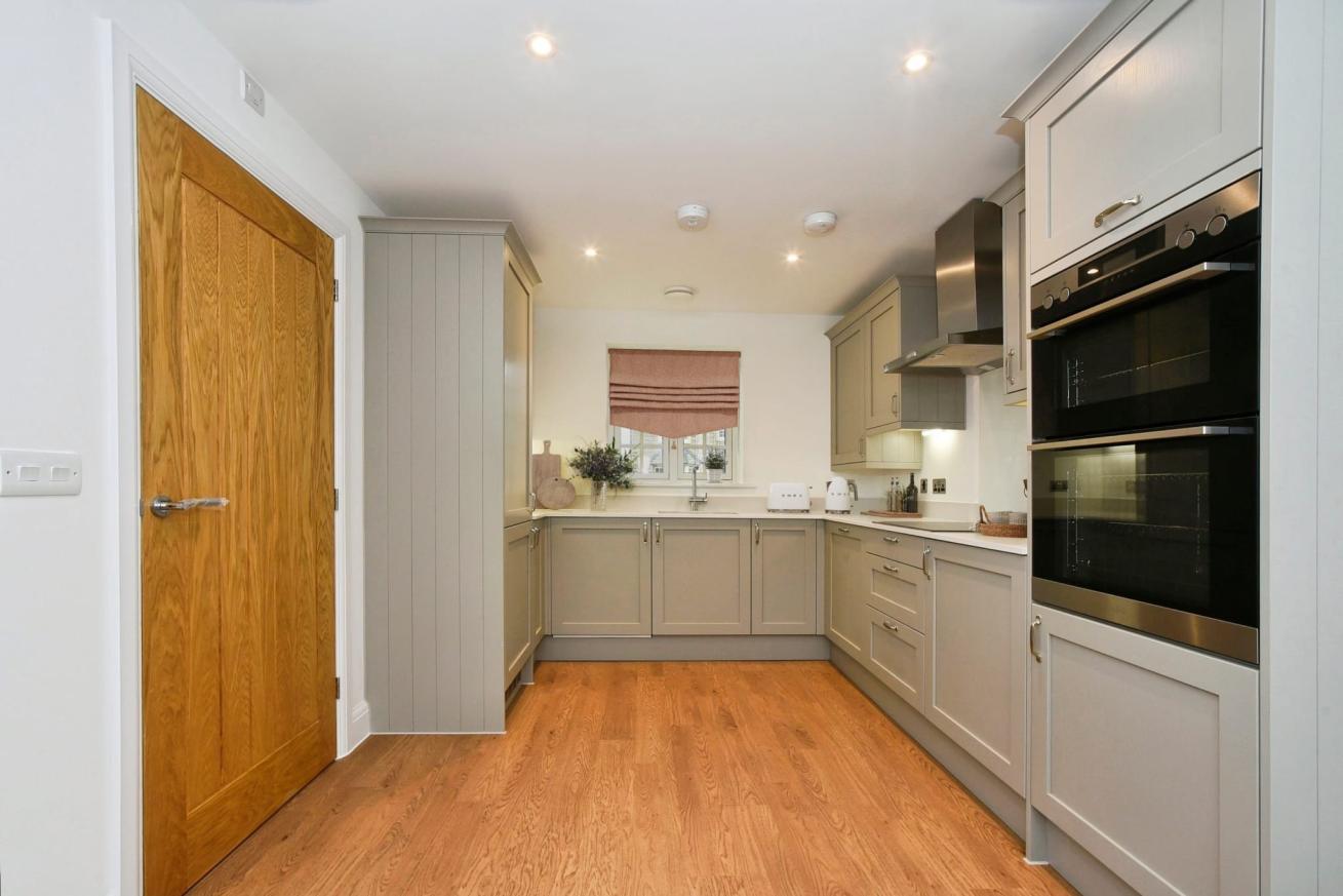 A computer generated image of the Kitchen at Ampney Meadows Plot 4