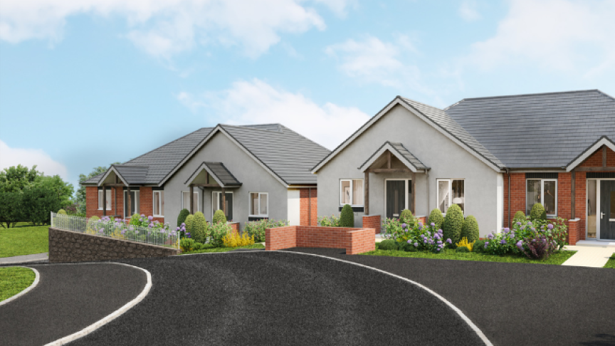 Street view of two bungalows on the corner of a road on a sunny day with blue skies
