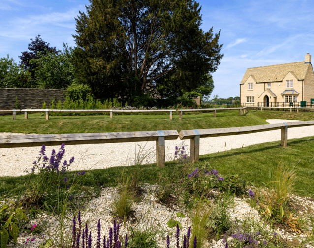Brand new houses in Cotswold stone, on a sunny day